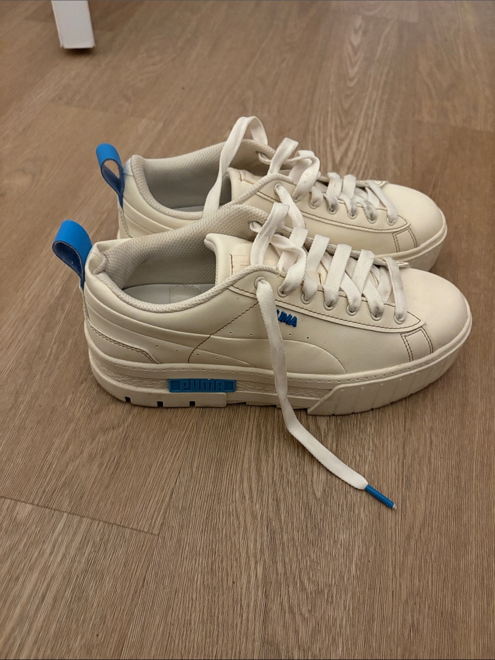 Puma Cream Sneakers with Blue Accents